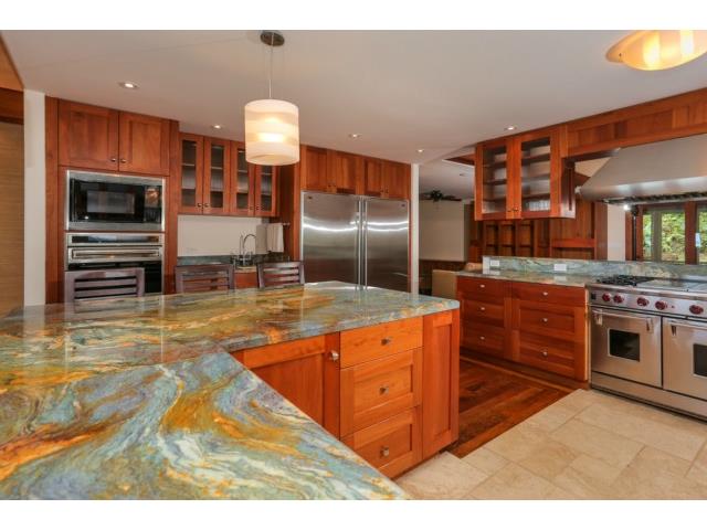 African Mahogany cabinets, topped with this exquisite stone coun