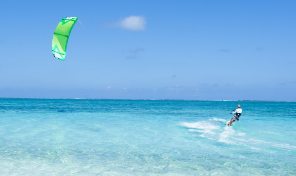 Kitesurfing on clear blue tropical water, Okinawa, Japan