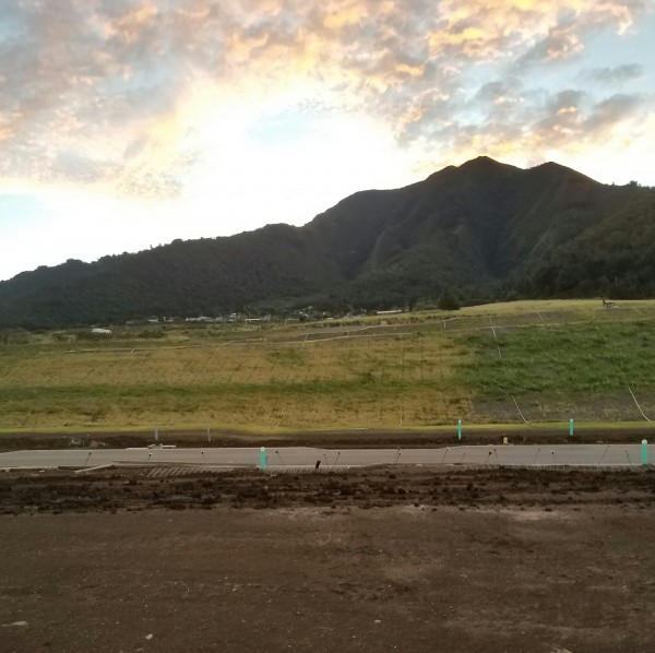 Sun setting behind the West Maui mountains